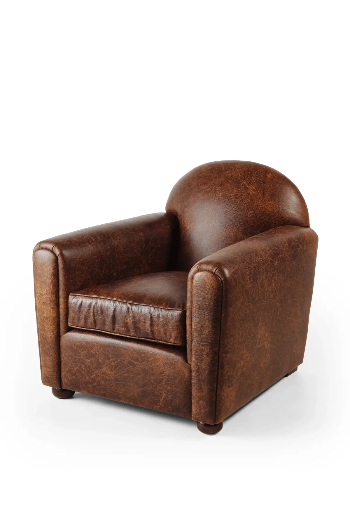 Distressed brown leather club armchair, studio product photography